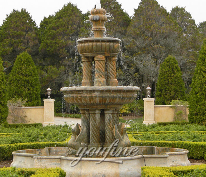 Outdoor large antique marble stone water bird bath fountain with column at foot of the hill